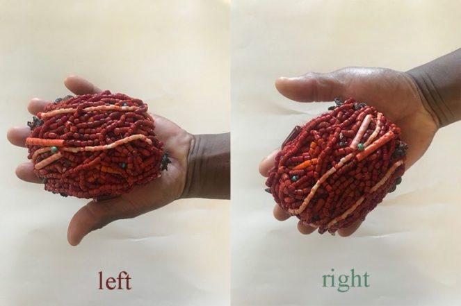 Limited Edition Fine Arts Print of digital artwork of two images of a hand with a red coral beaded round object
